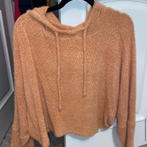 Cropped, hooded sweater